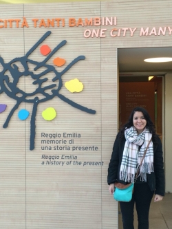 Student in front of Reggio Emilia